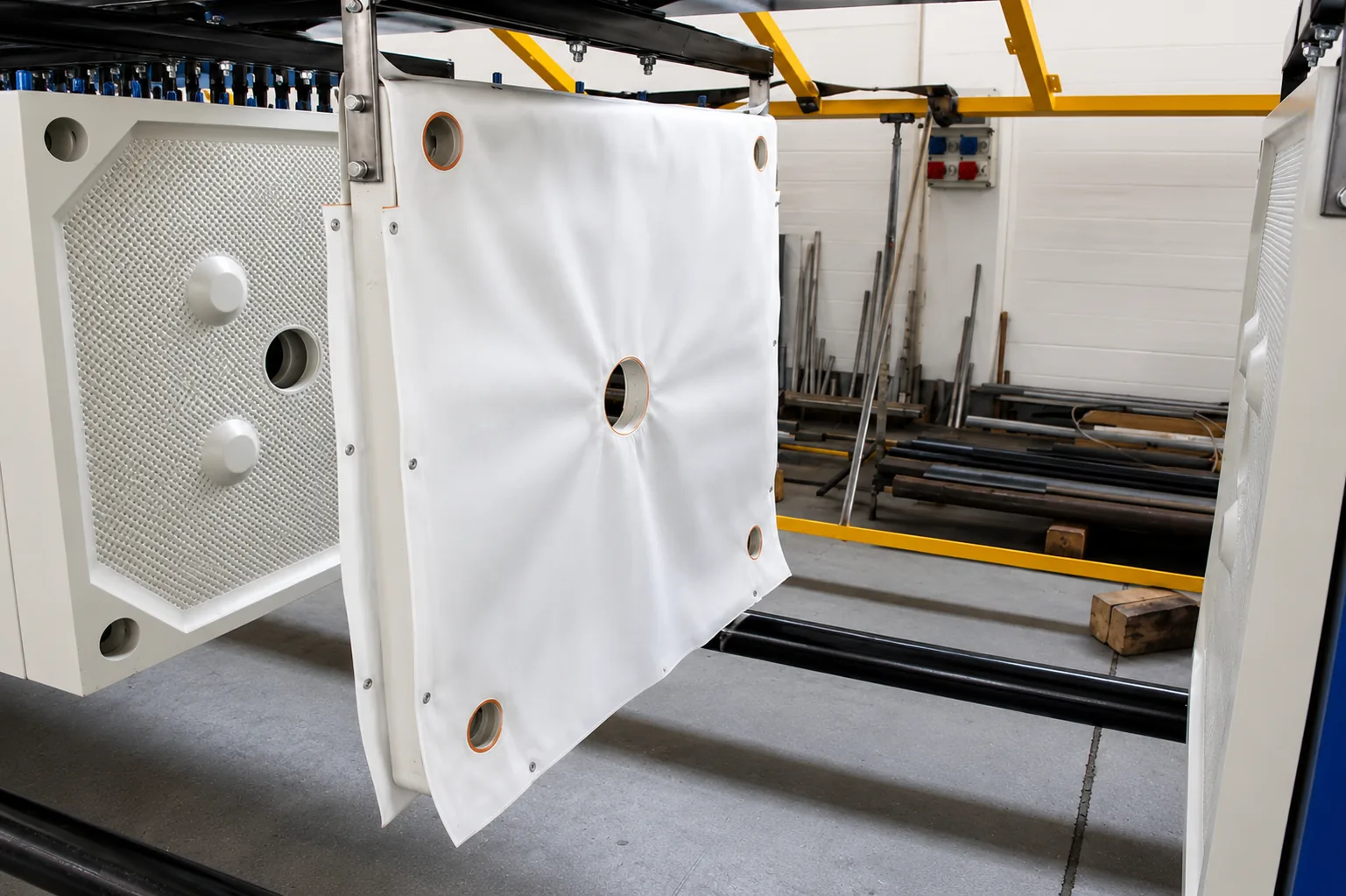 Custom filter cloth installed on industrial filter press plates