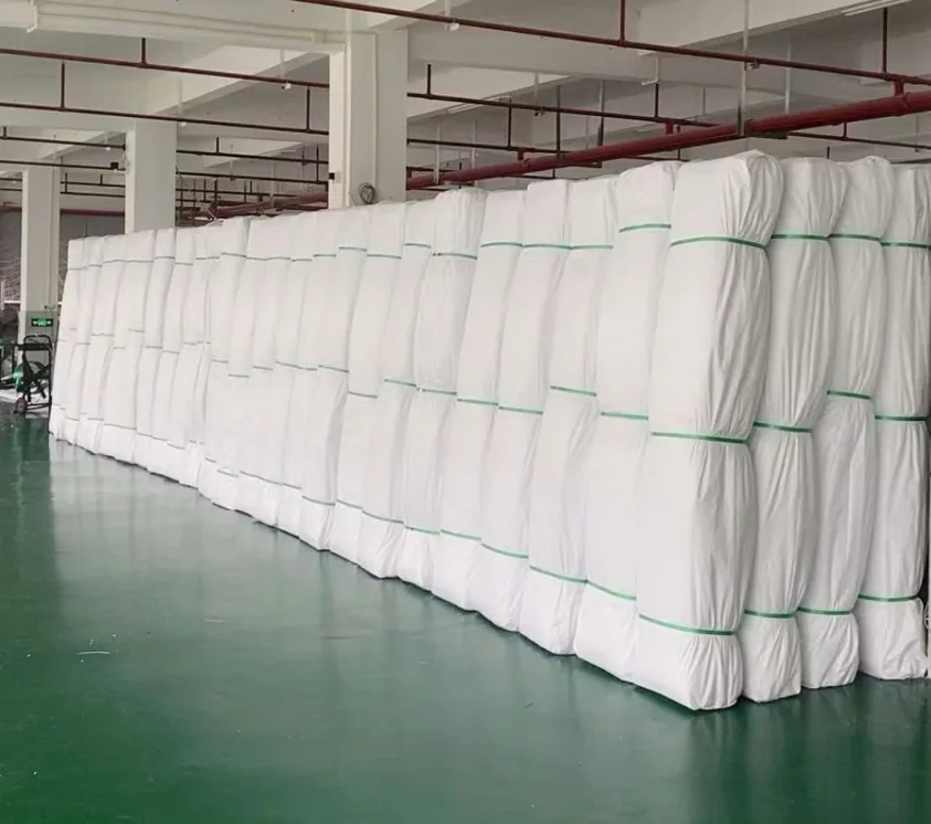 White filter cloth rolls bundled and ready for replacement stock supply