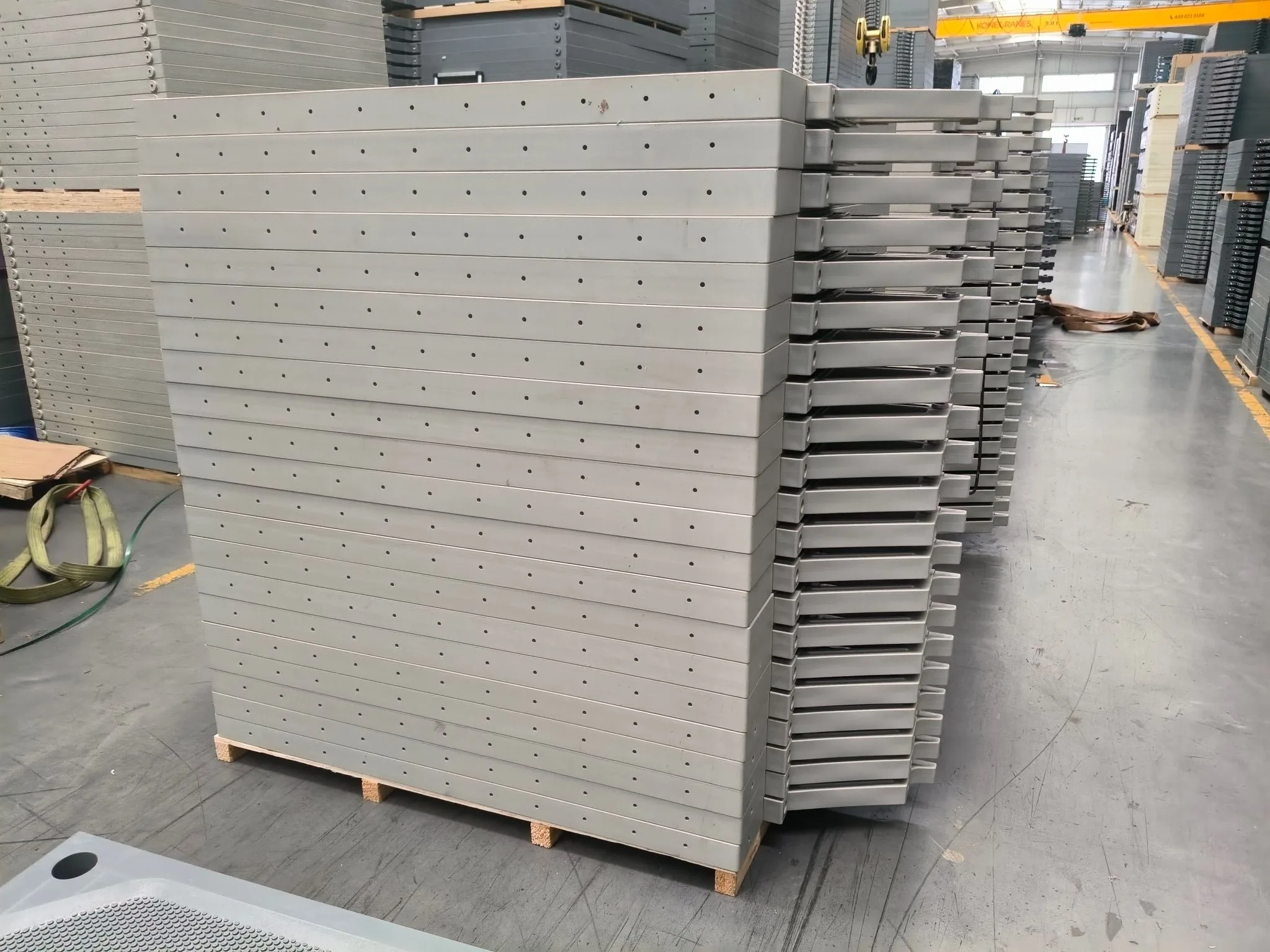 Finished filter plates stacked on pallets before shipment