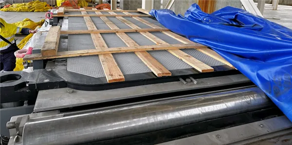 PF60-class tower press plate pack protected during maintenance